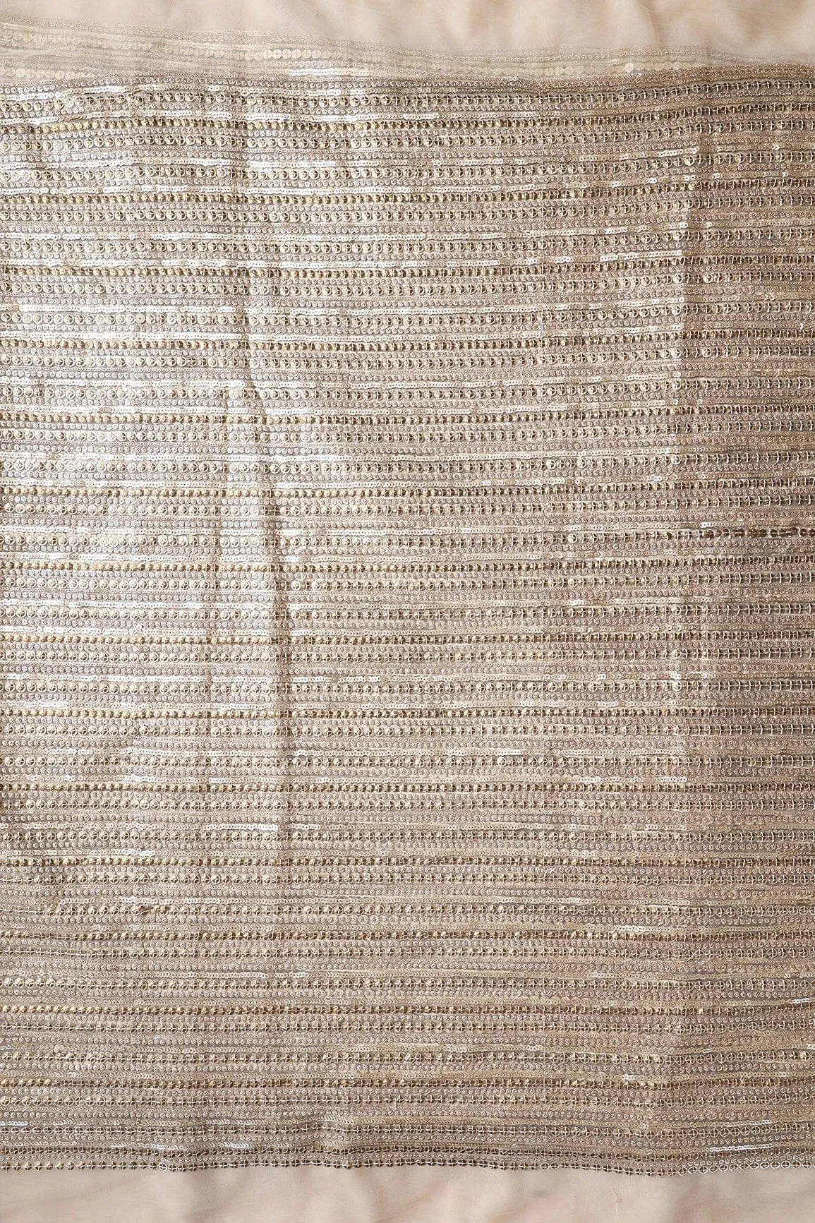 Beautiful Heavy Sequins With Zari Stripes Embroidery On Beige Soft Net Fabric