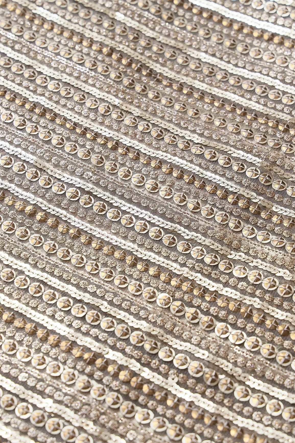 Beautiful Heavy Sequins With Zari Stripes Embroidery On Beige Soft Net Fabric