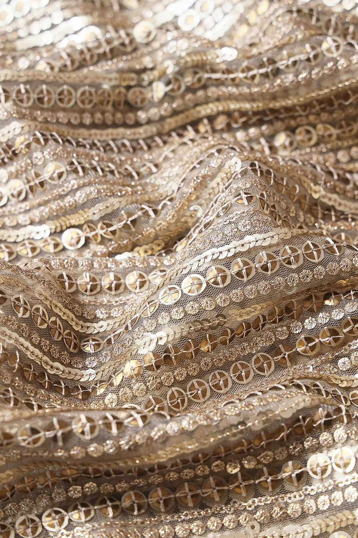 Beautiful Heavy Sequins With Zari Stripes Embroidery On Beige Soft Net Fabric