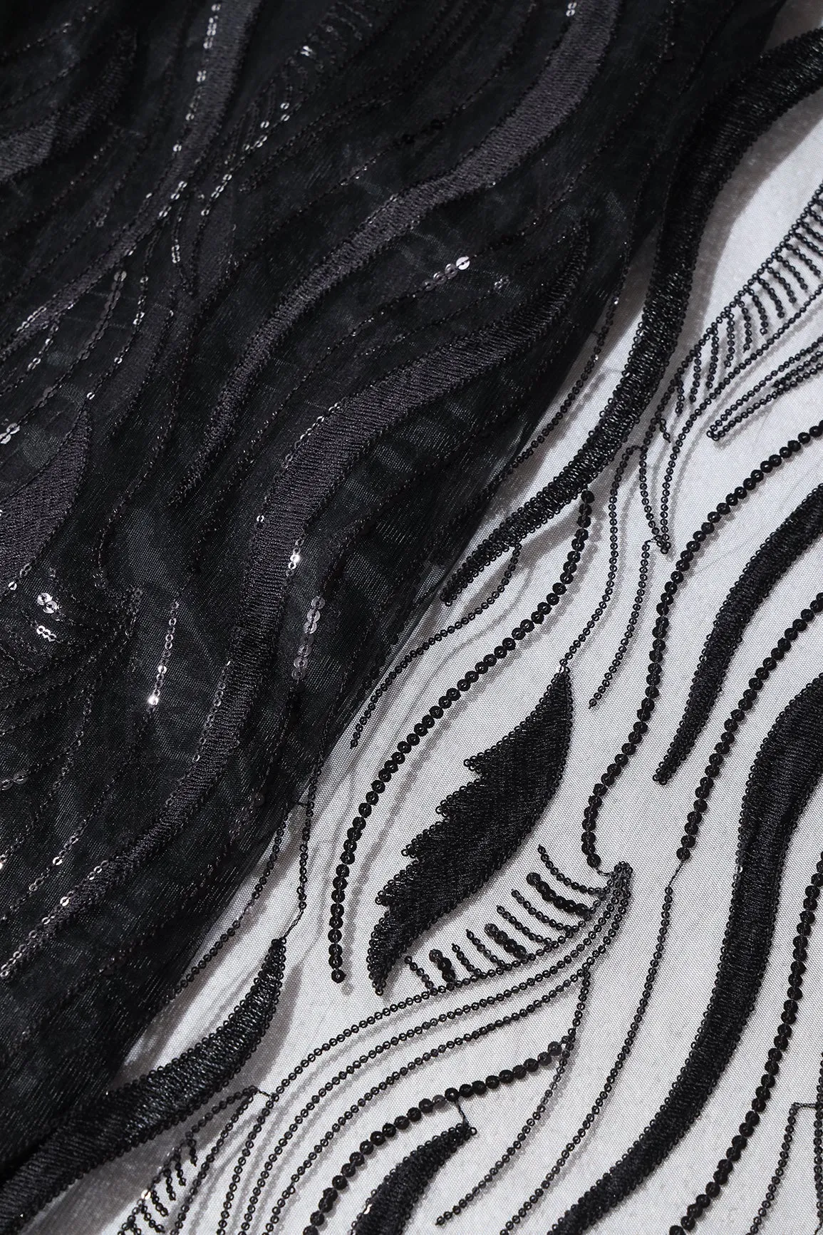 Black Thread With Sequins Wavy Embroidery Work On Black Soft Net Fabric
