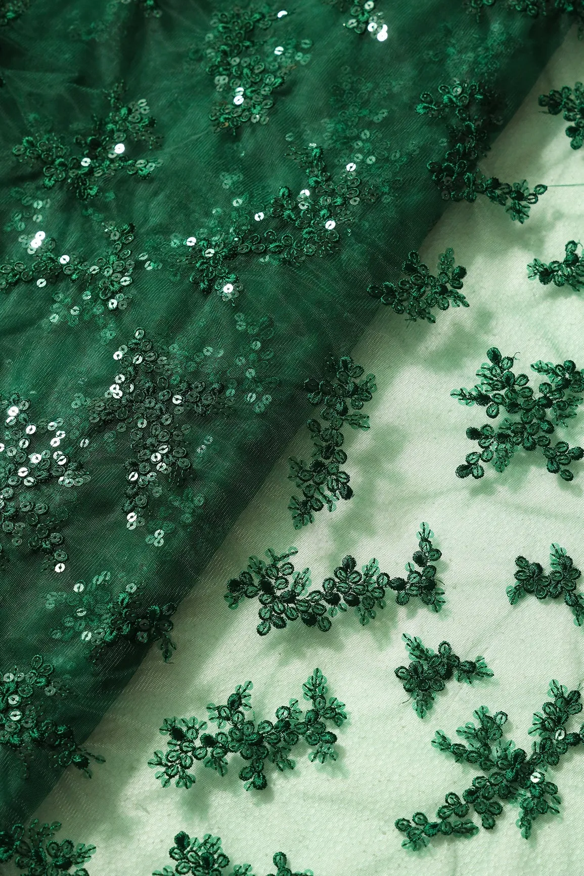 Exclusive Green Thread With Sequins Abstract Embroidery Work On Bottle Green Soft Net Fabric