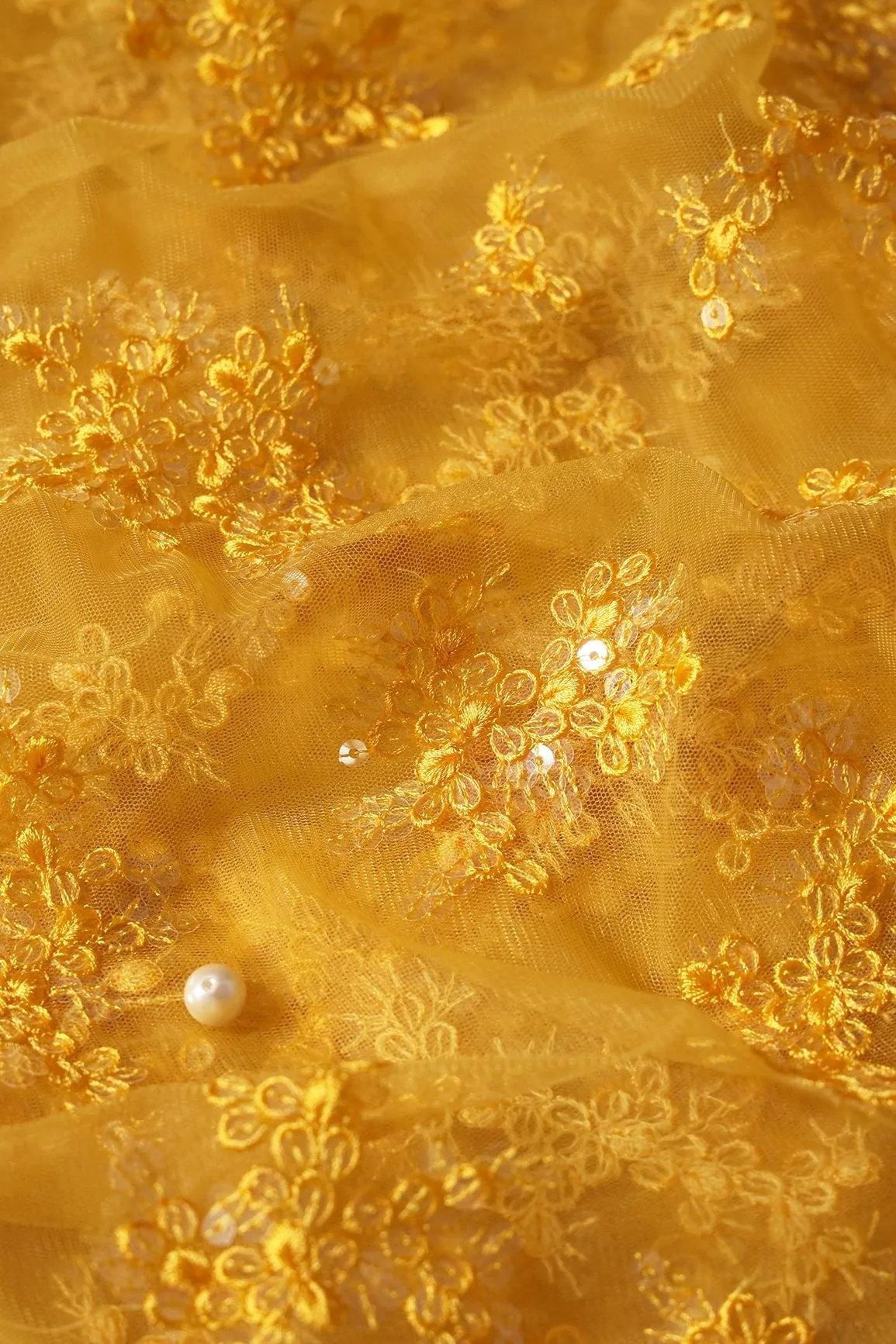 Exclusive Yellow Thread With Sequins Abstract Embroidery Work On Mustard Yellow Soft Net Fabric
