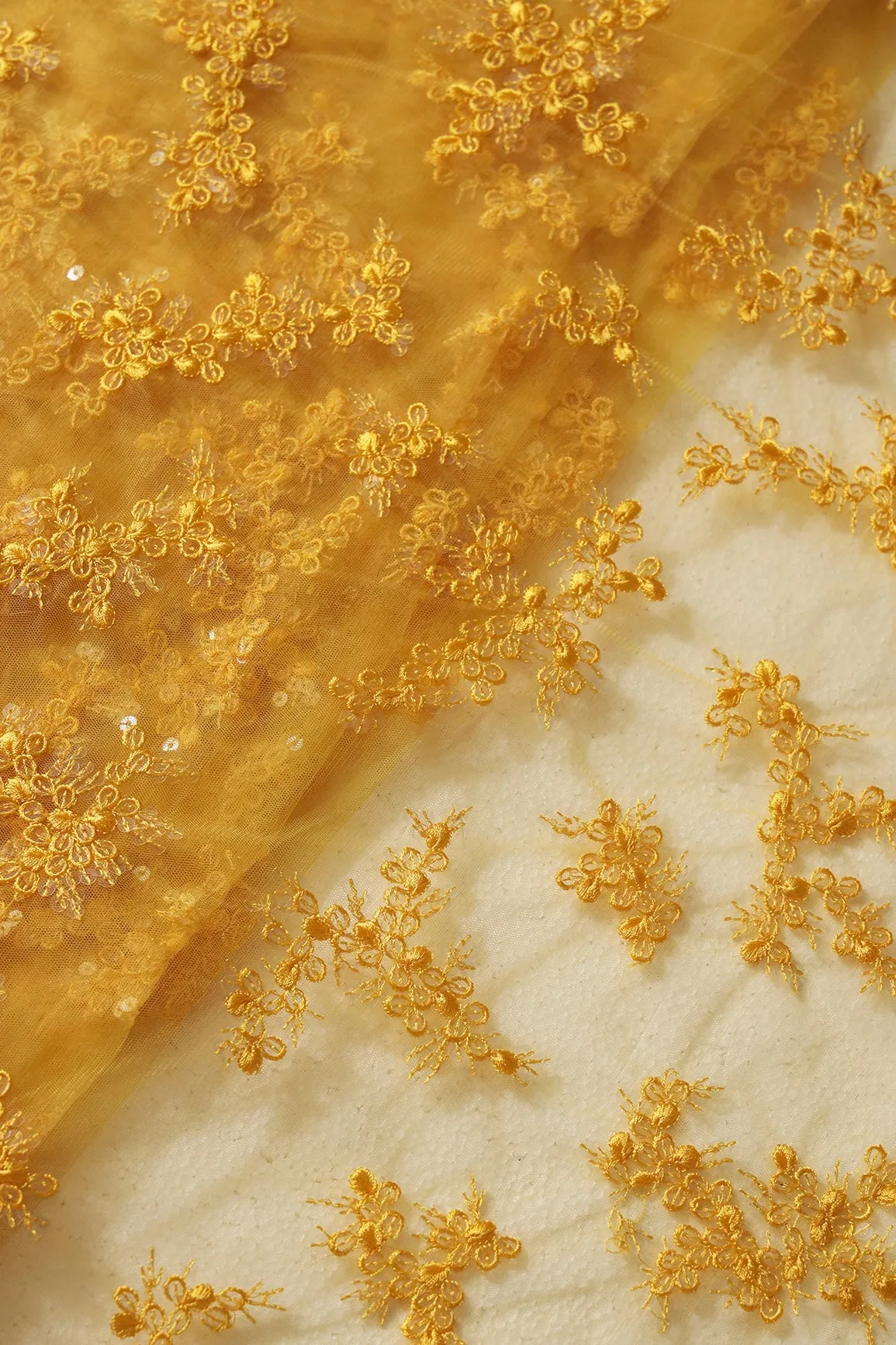 Exclusive Yellow Thread With Sequins Abstract Embroidery Work On Mustard Yellow Soft Net Fabric