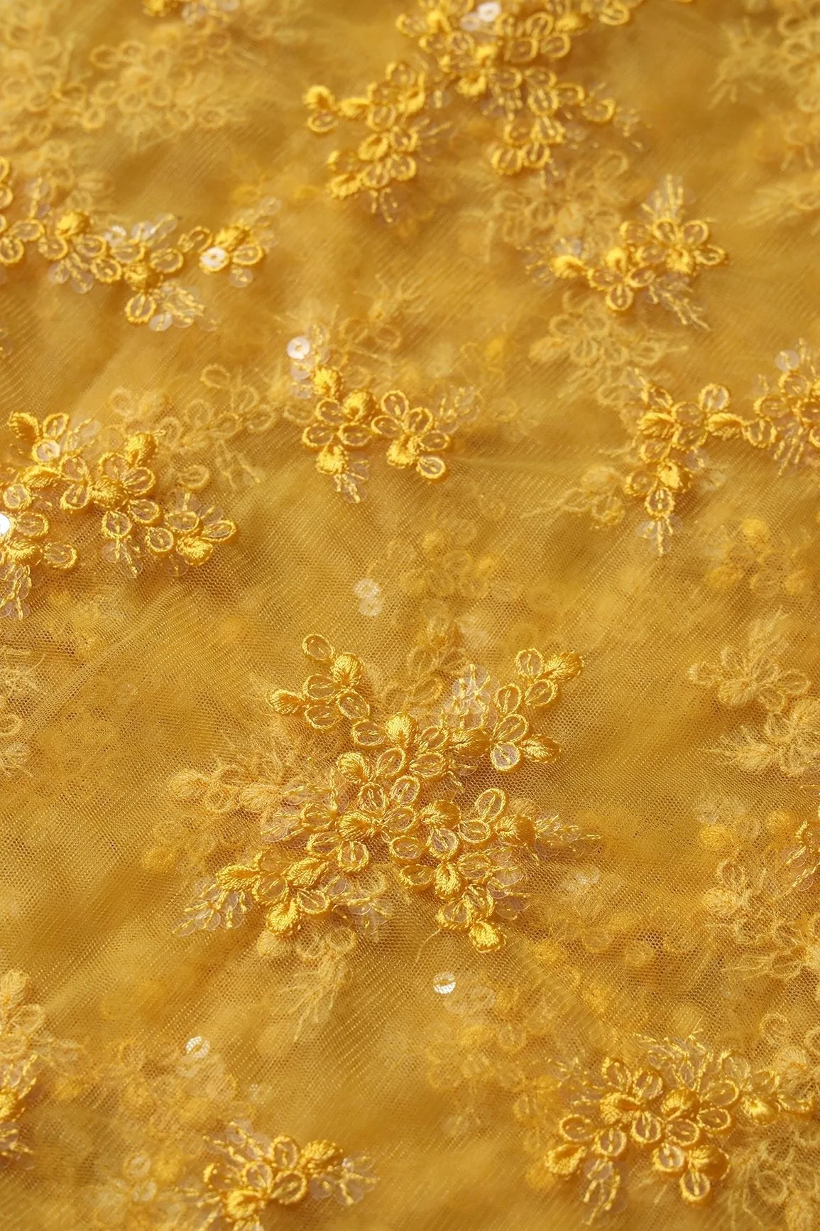 Exclusive Yellow Thread With Sequins Abstract Embroidery Work On Mustard Yellow Soft Net Fabric